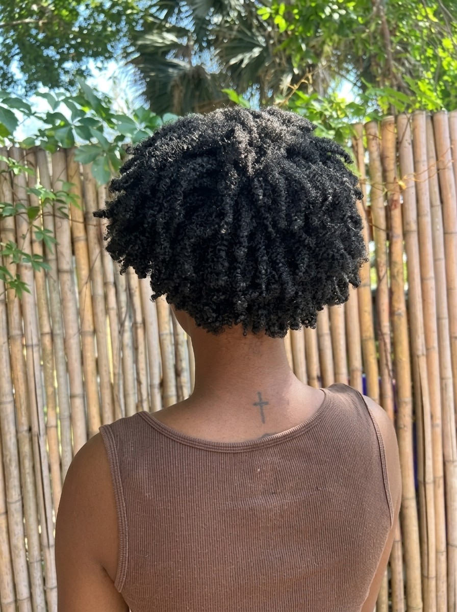 Short coily hair seen from behind, densely packed with a cottony texture